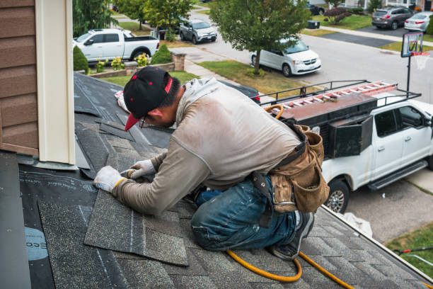 Professional Roofing technician working in Madbury, NH